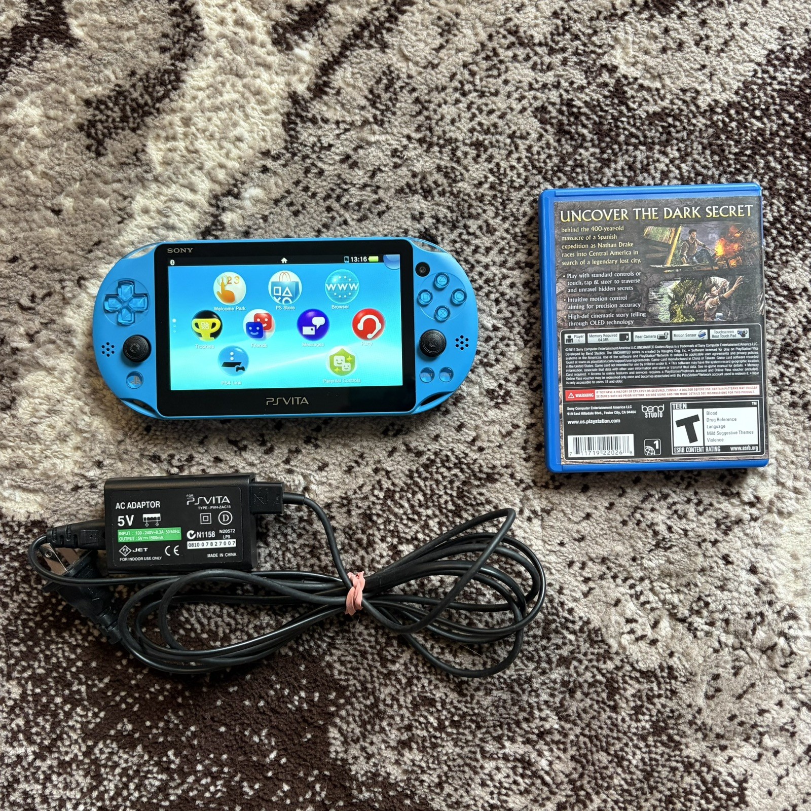PS Vita Blue PCH-2000 ZA23 Slim Aqua Bundle, 2 Games + Charger 16GB Memory