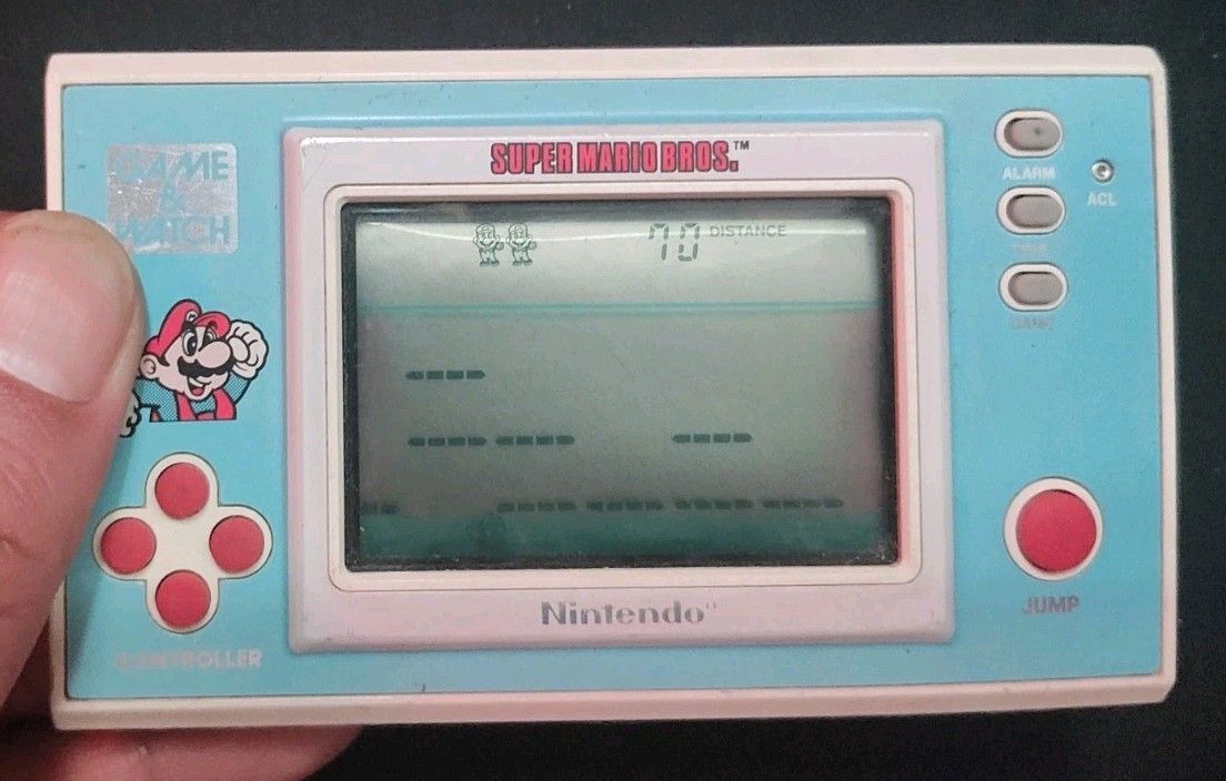 Nintendo Game and Watch Super Mario Bros. Handheld System 1988/ YM-105 / Tested