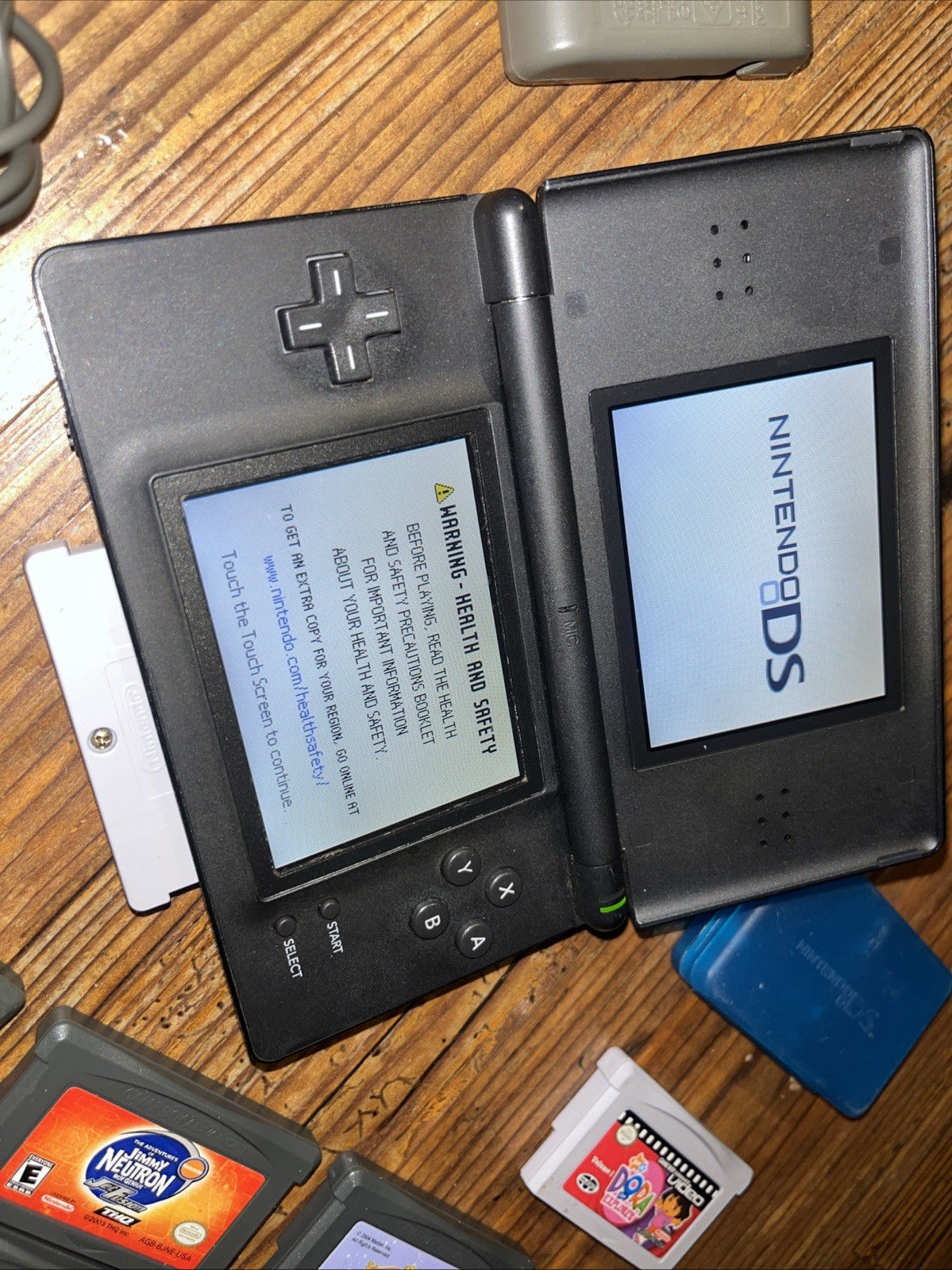 Nintendo DS Lite Black Console Bundle with 9 games – Tested & Working
