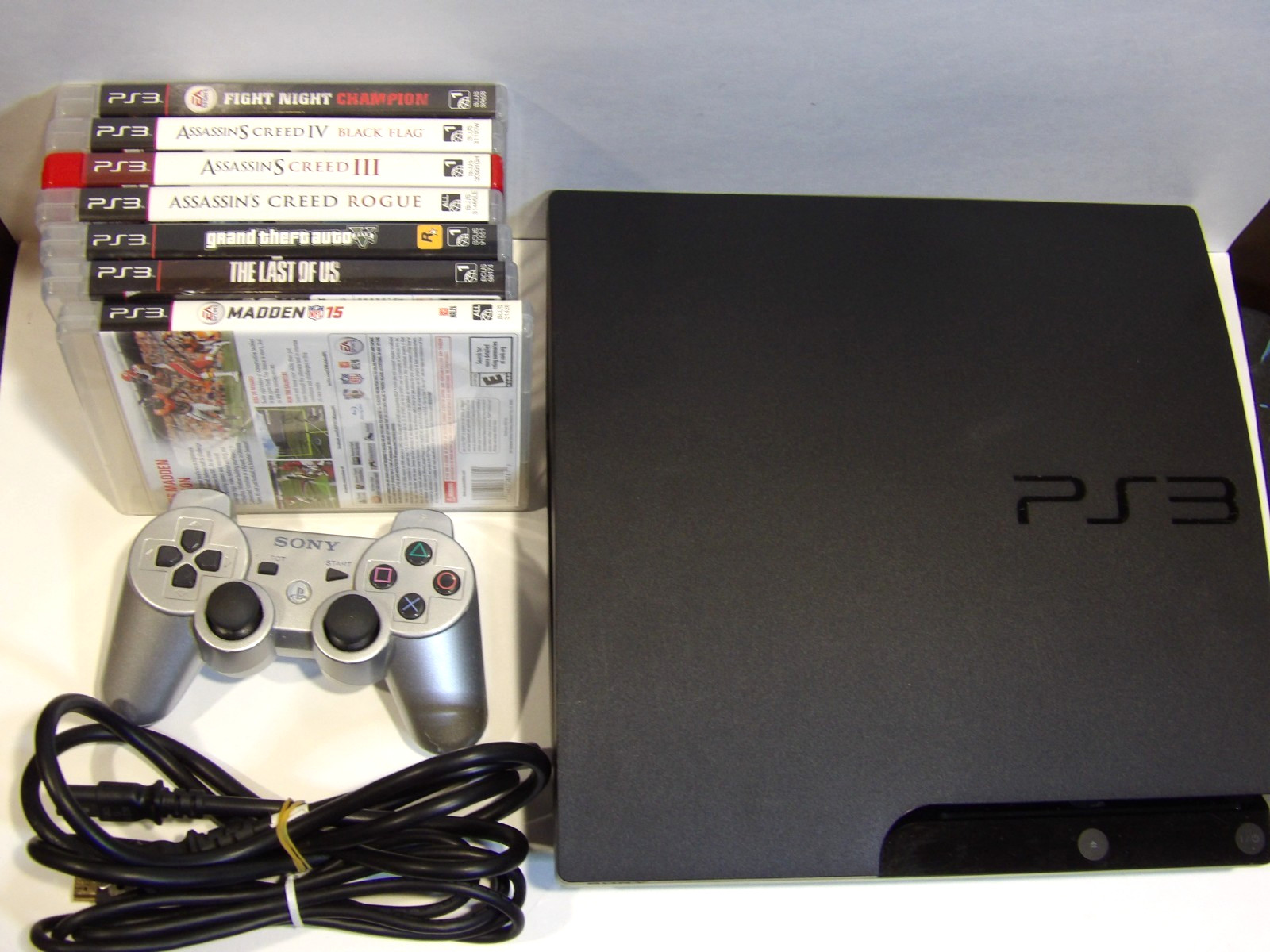 Sony PlayStation 3 PS3 Slim 160GB Console CECH-3001A Bundle with 7 Games & OEM