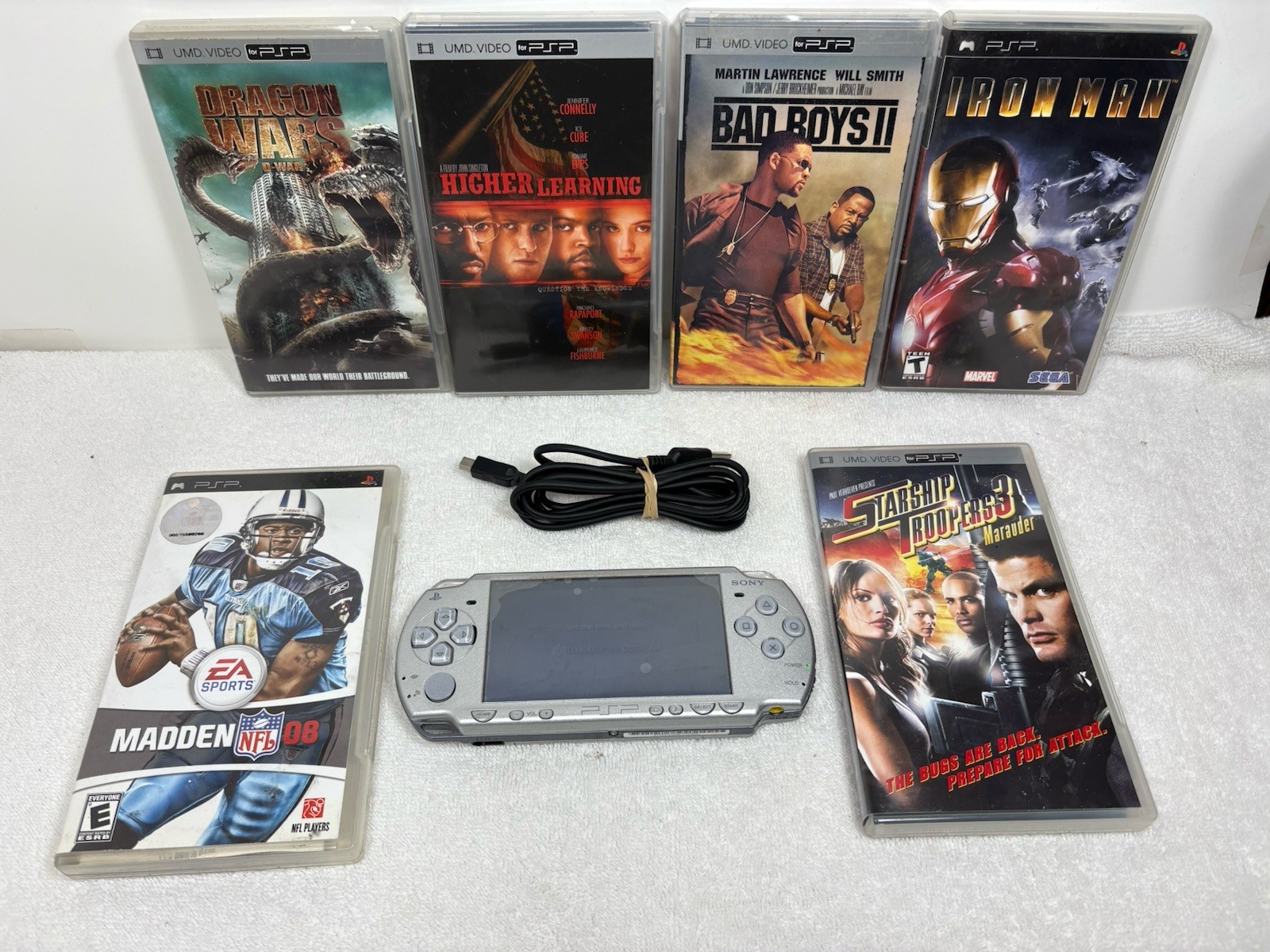 Sony PSP 2001 Handheld Console System with New Battery, Charger and Games