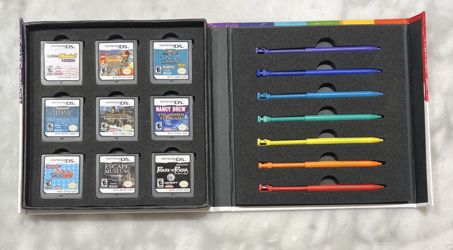 Nintendo DS Lite Cobalt Blue Console Bundle 9 Games New Battery Charger Cases