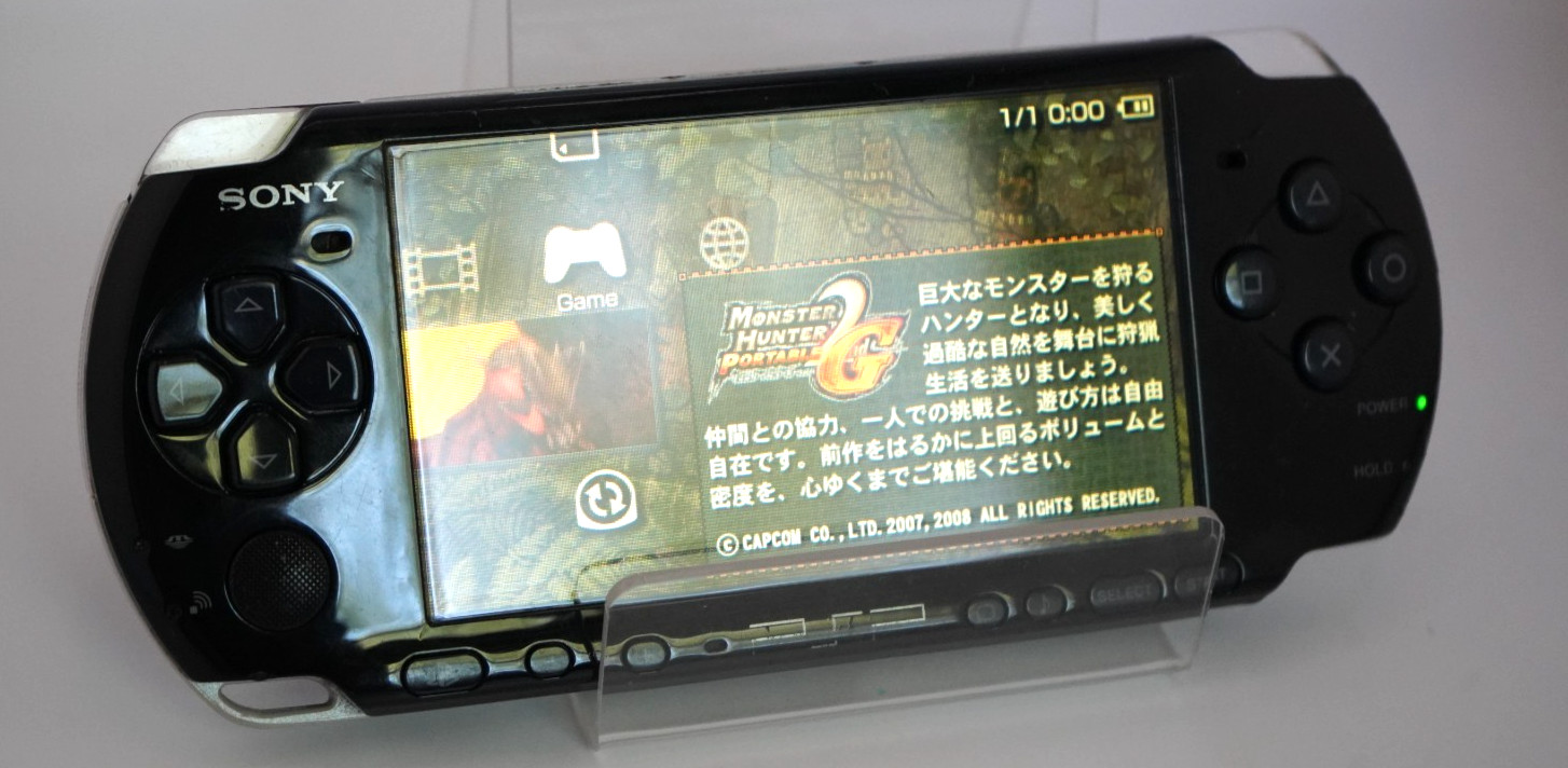 Sony PSP-3000 Console with OEM Battery, Game, 64GB SD, Case Bundle – Piano Black