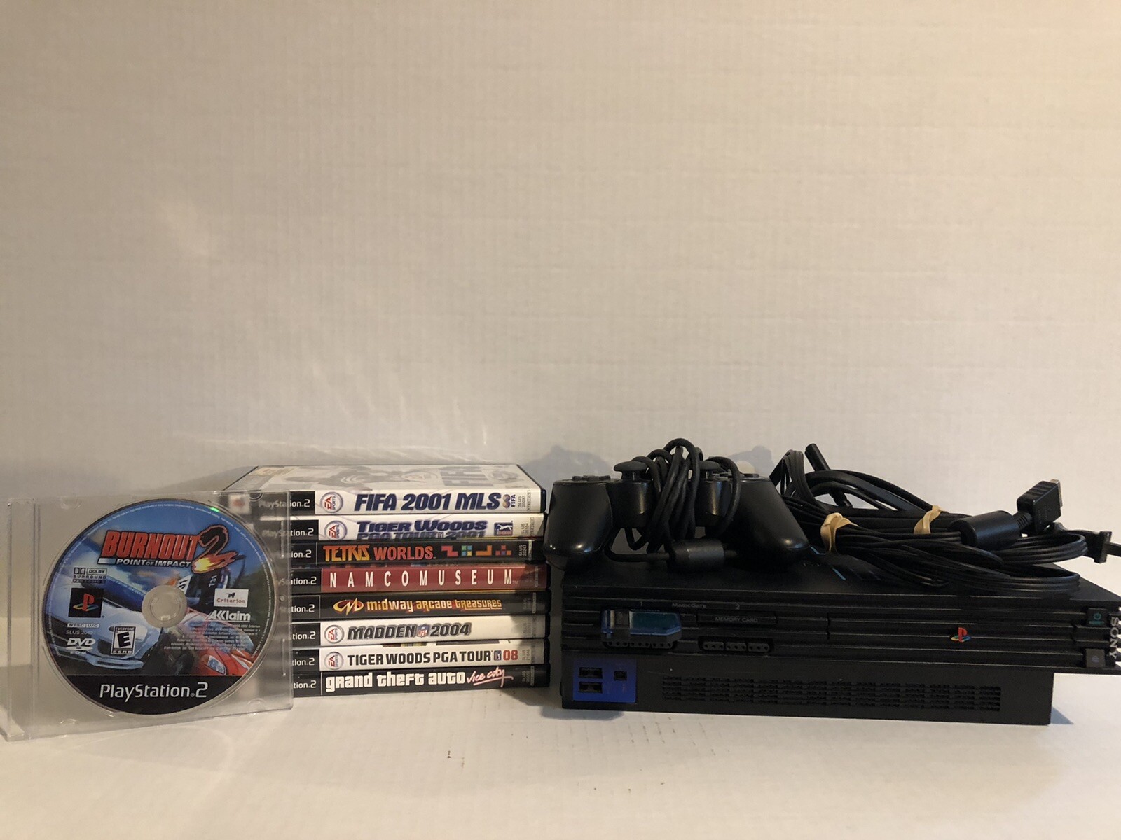 Sony PlayStation 2 w Memory Card & 9 Games. Used Good Condition