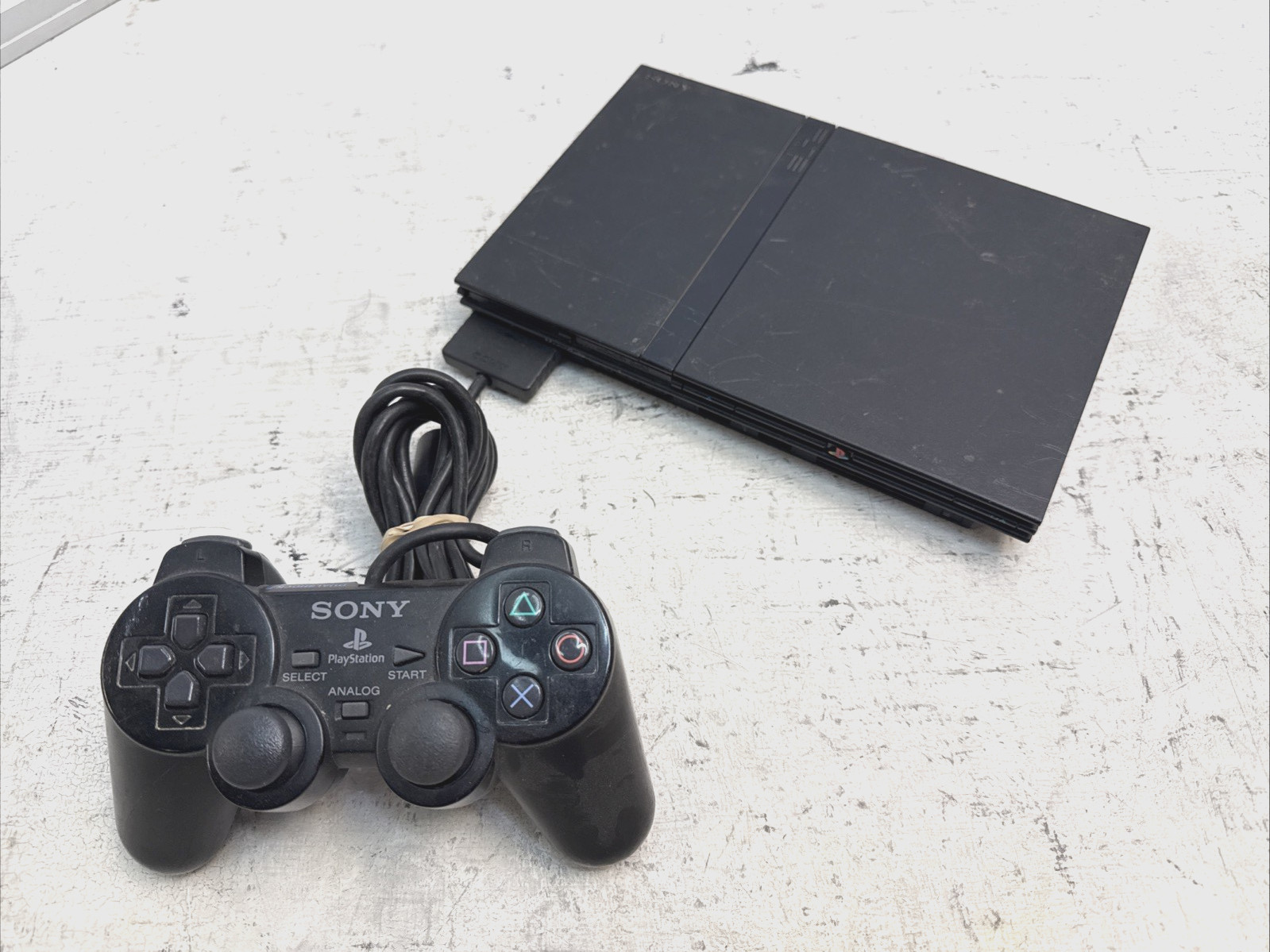 Sony PlayStation 2 Slim Console and Controller Only. Color may Vary.