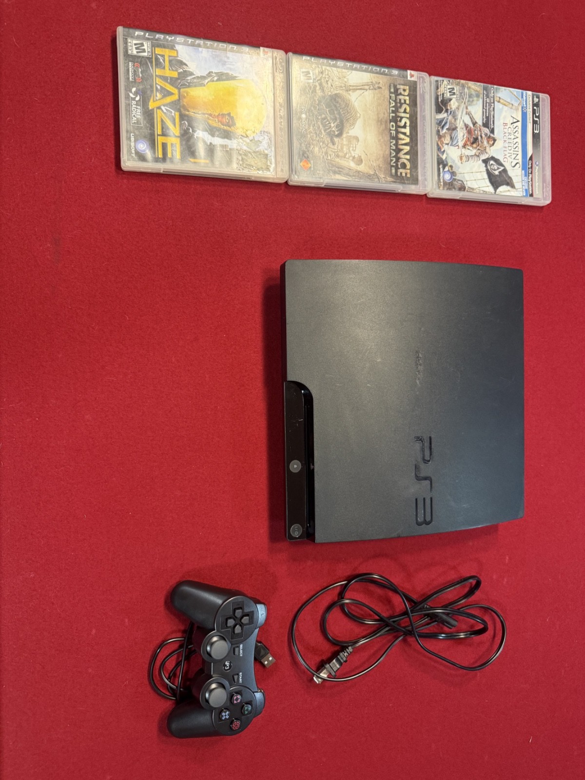 PS3 Slim Bundle: 1 Controller, 3 Games, Includes Power Cord and New 500 Gb HDD