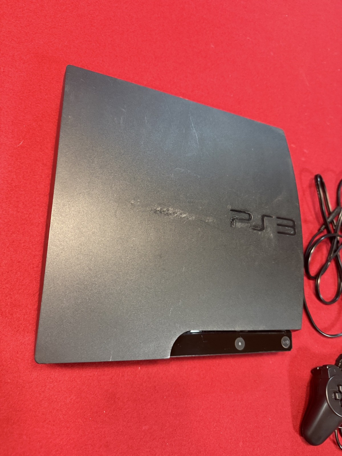 PS3 Slim Bundle: 1 Controller, 3 Games, Includes Power Cord and New 500 Gb HDD