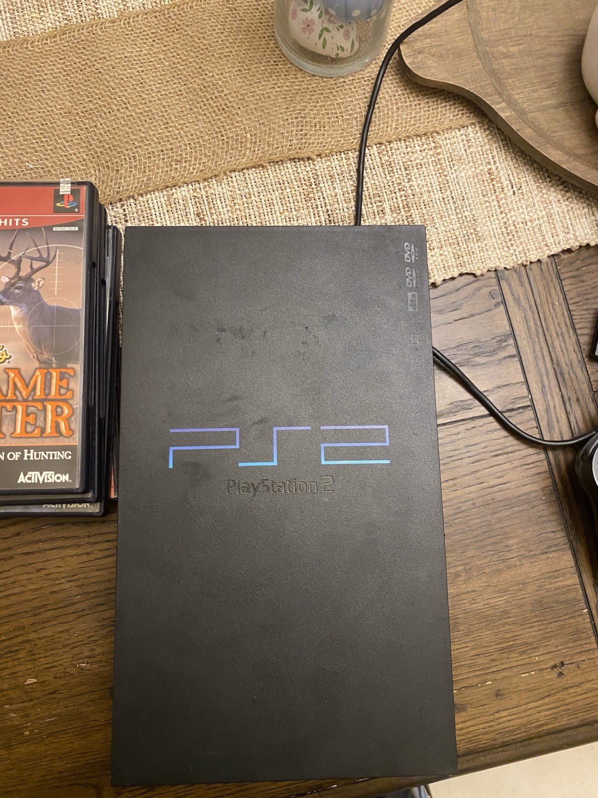 PS2 with Controller, 4 Games, And A 8mb Memory Card