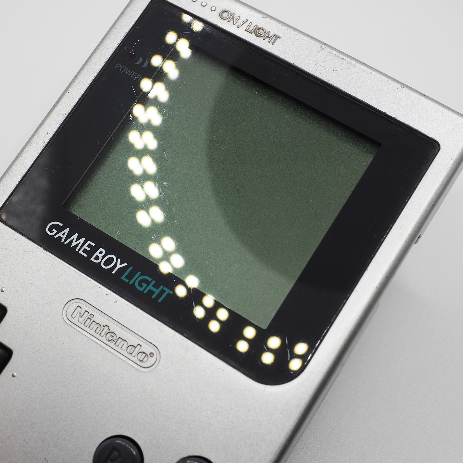 Nintendo Game Boy Light SILVER console MGB-101 WORKING CLEANED #0141_32[VG]