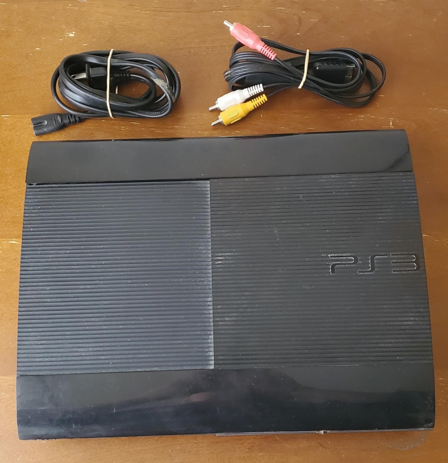 Super Slim Charcoal Black Top-Loader PlayStation3 w/ Cables
