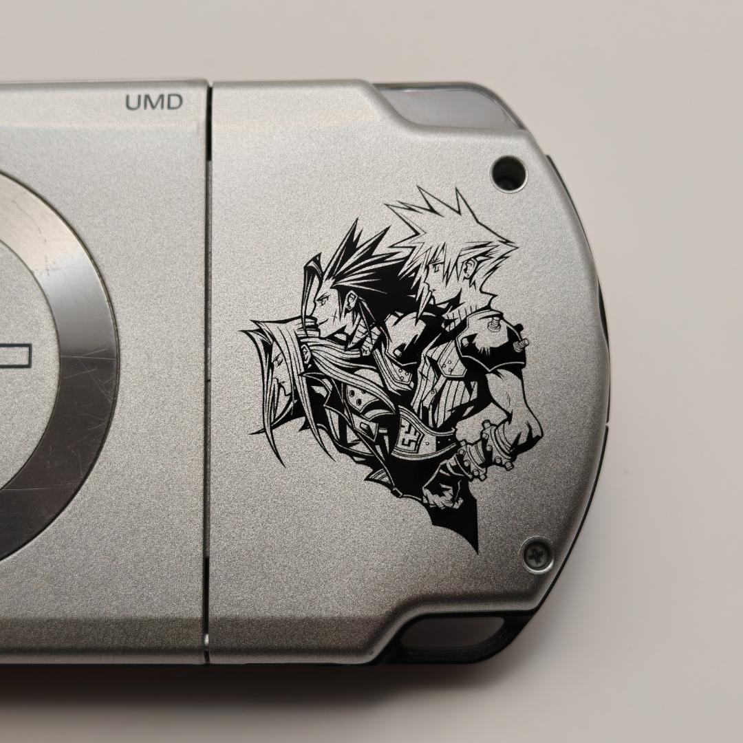 Sony PSP 2000 Crisis Core: Final Fantasy VII Bundle 64MB Silver Handheld System