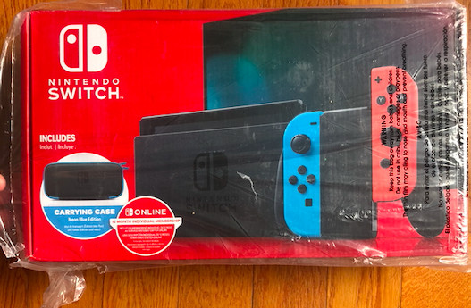 Brand new Nintendo Switch NVIDIA 32GB Neon Red/Neon Blue Console 12 months sub