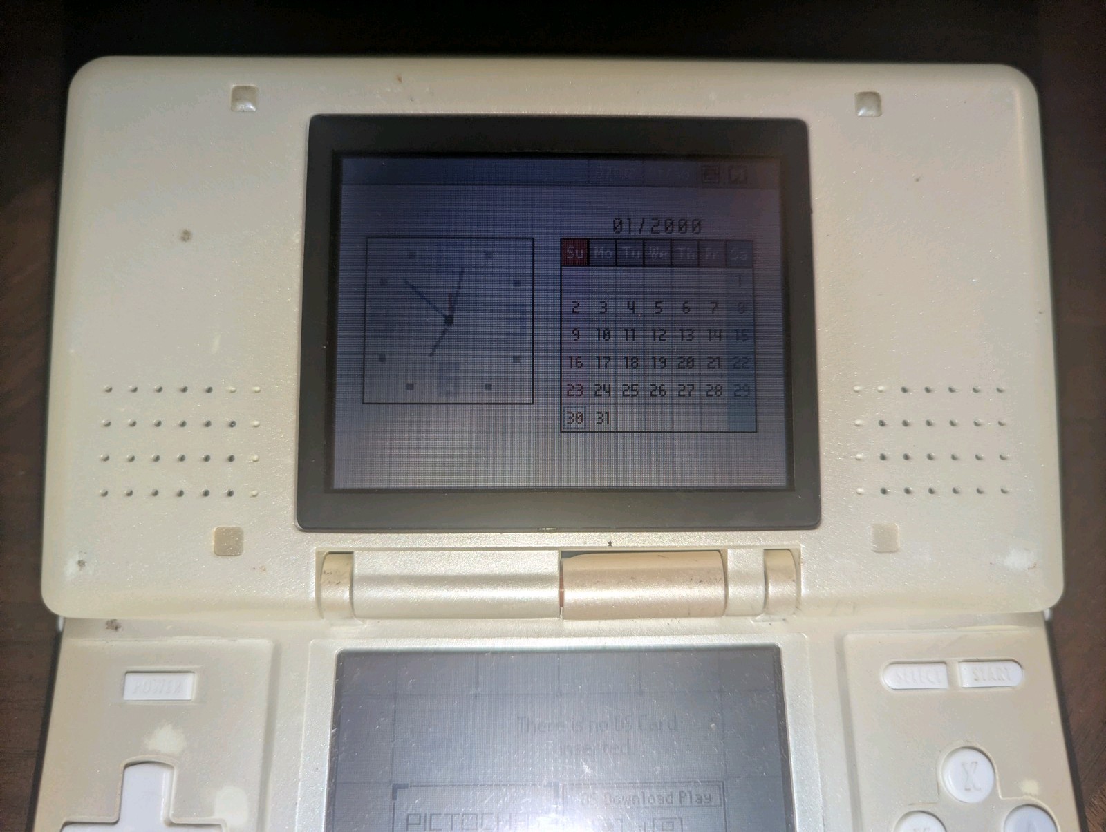 Nintendo DS Handheld Pearl White Model NTR – Turns On Doesn’t Read Games As-Is