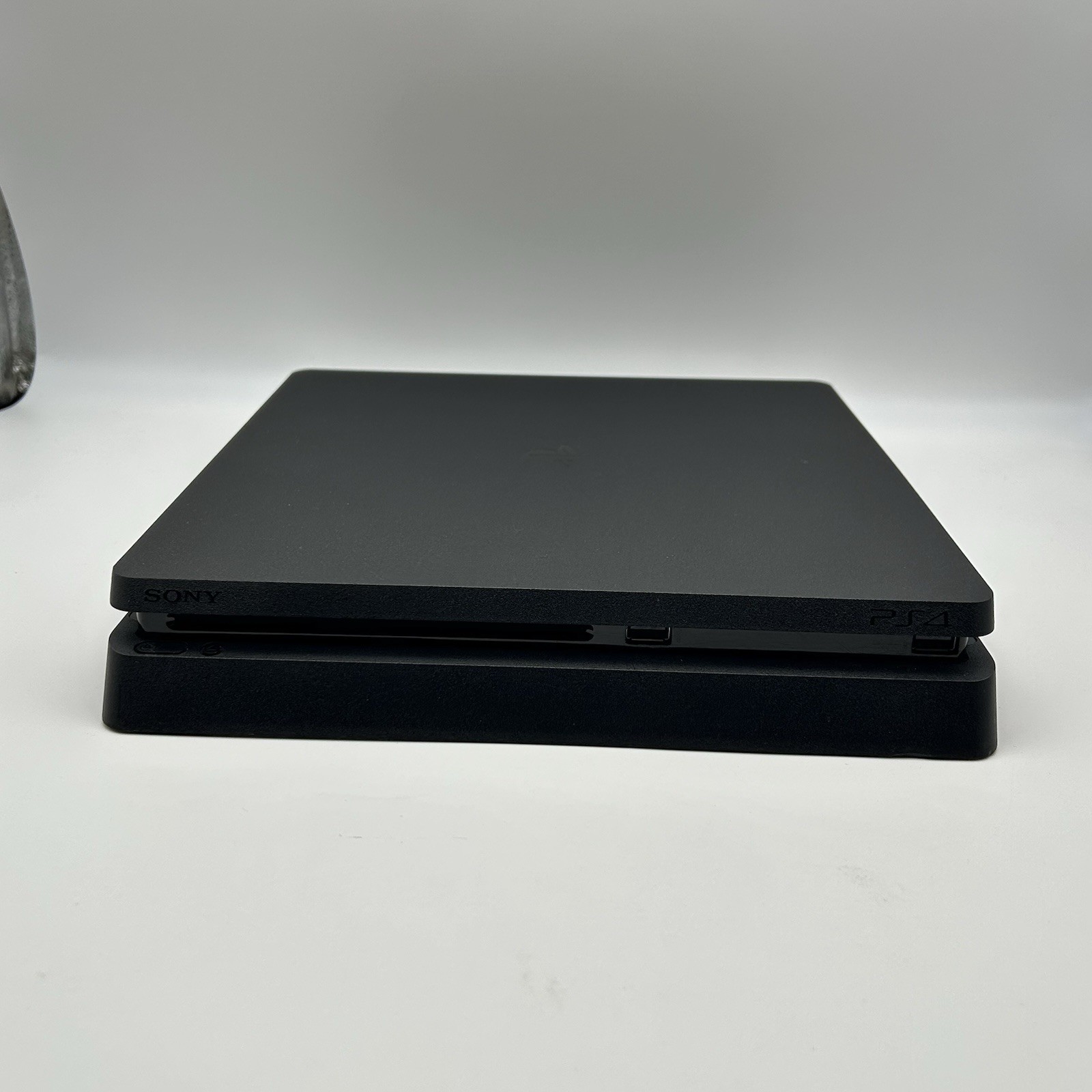 Sony PS4 Slim 1TB Console Bundle [Includes 2 Controllers, Power Cord, HDMI Cord]
