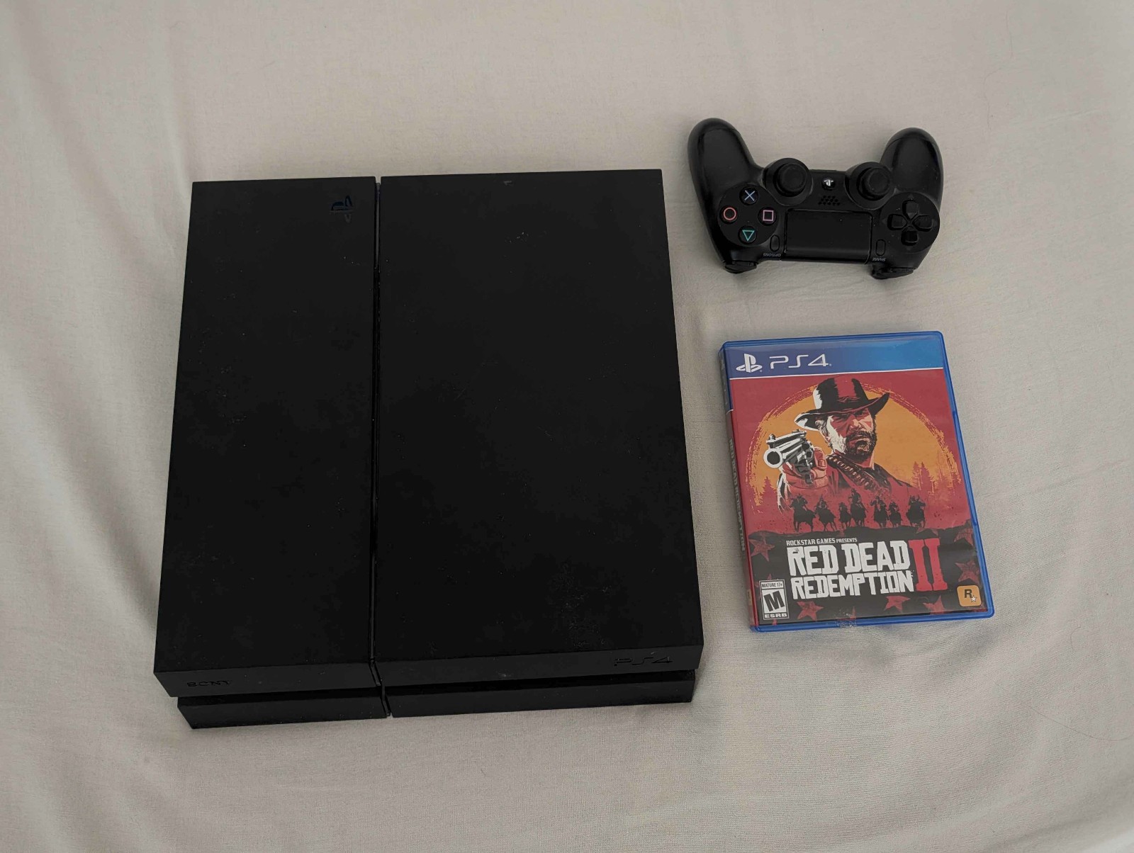 Sony PlayStation 4 w/ controller and game