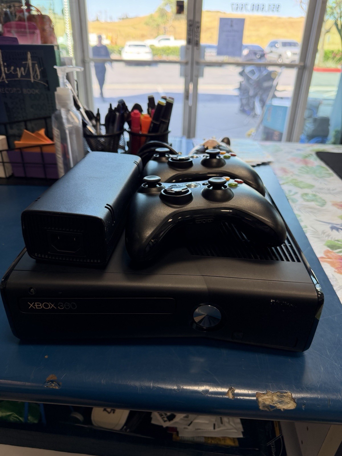 Microsoft Xbox 360 Slim console bundle with two controllers