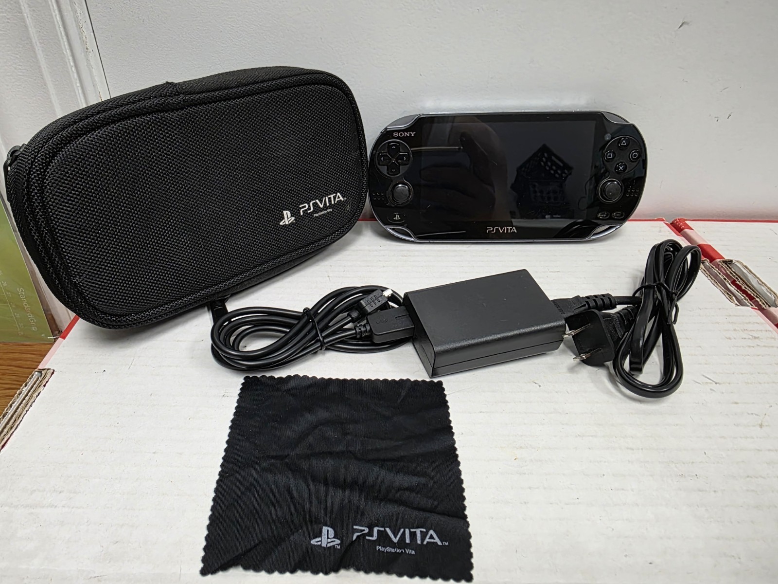 PlayStation PS Vita PCH-1001 Bundle Console -New Charger- Case- SD Card- Tested