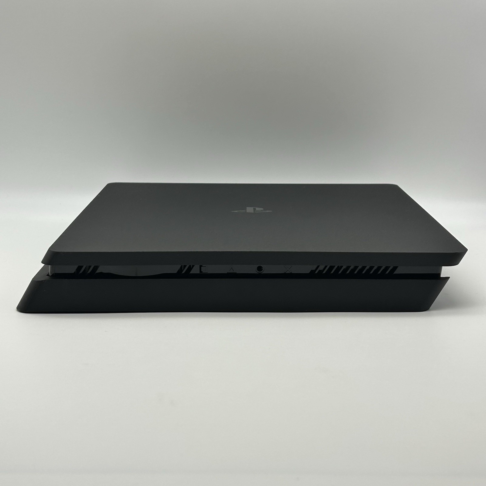 Sony PS4 Slim 1TB Console Bundle [Includes 2 Controllers, Power Cord, HDMI Cord]