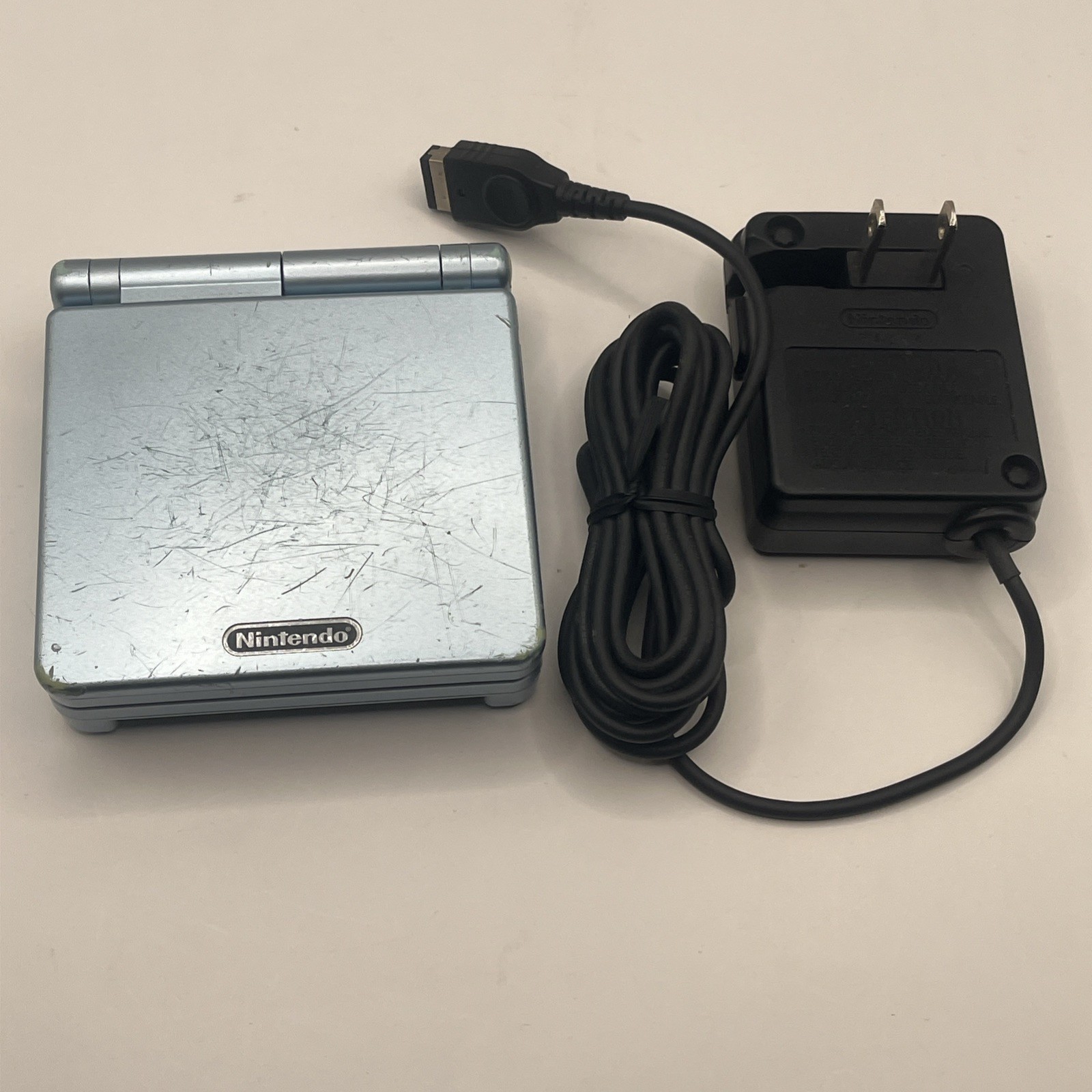 Authentic Nintendo OEM Game Boy Advance SP GBA SP – Pearl Blue AGS-001 + Charger