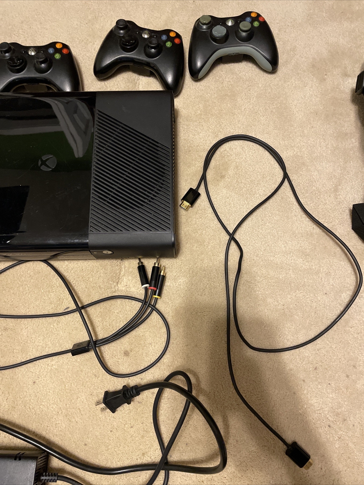 Microsoft Xbox 360 E + 6 Games + 3 Controllers + Necessary Cables