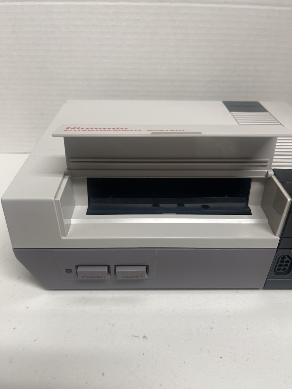 Original Nintendo NES bundle with cords, 2 controllers, zapper, and 17 games