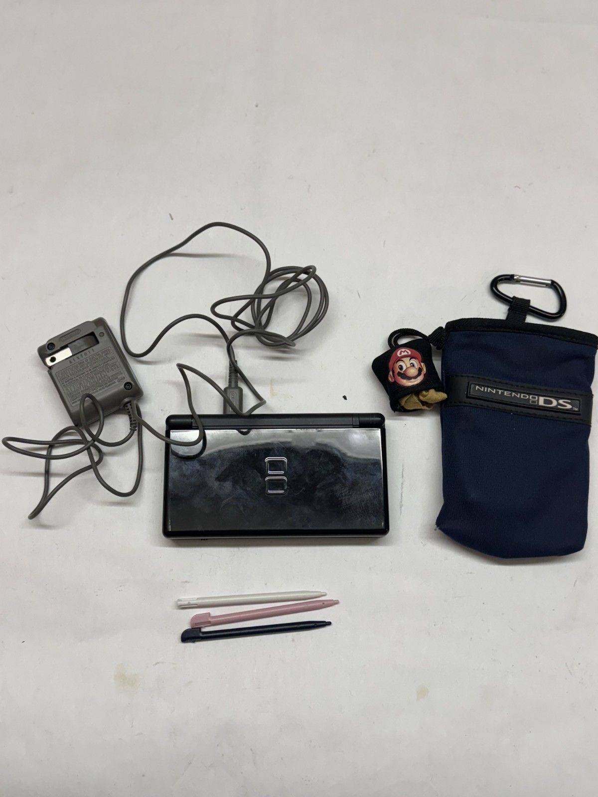Black Nintendo Ds Lite with Charger, switch n carry case, and extra stylus WORKS