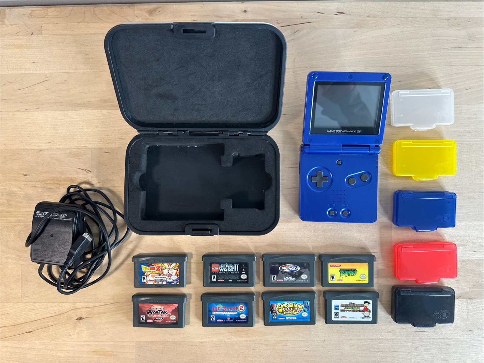 Nintendo Game Boy Advance SP – Cobalt Blue – NEW BATTERY + 8 Games + cases