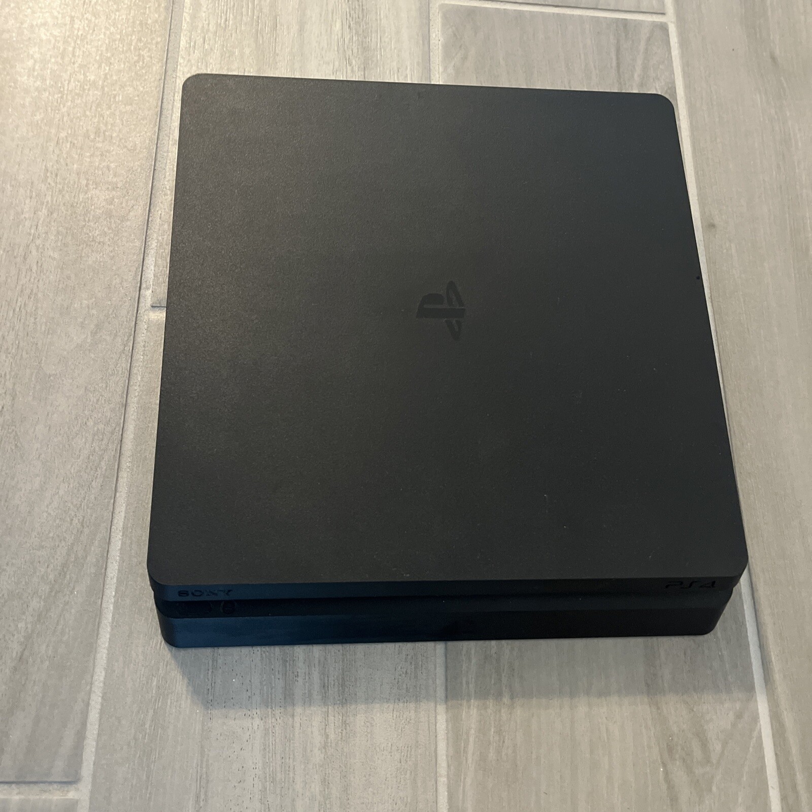 Sony PlayStation 4 Slim with 1tb SSD Samsung EVO 850 W/ Controller And All Cords