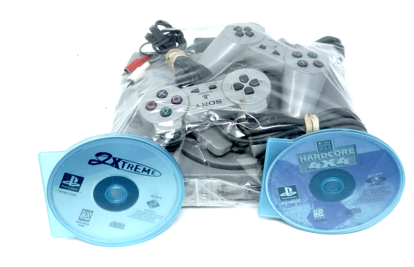 Sony PlayStation (SCPH-5501) +2 Controllers +All Cables +2 PS1 Black Label Games
