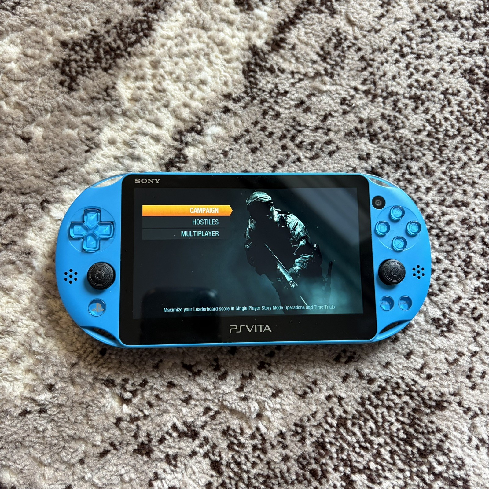 PS Vita Blue PCH-2000 ZA23 Slim Aqua Bundle, 2 Games + Charger 16GB Memory