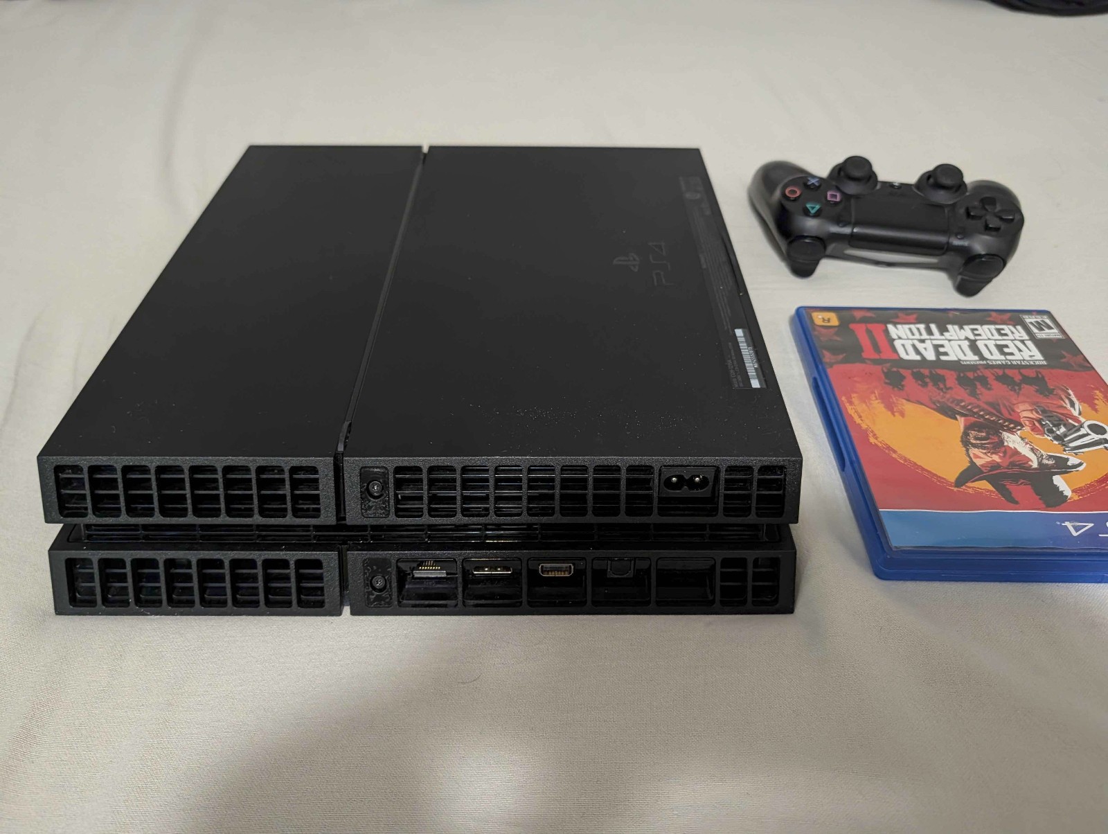 Sony PlayStation 4 w/ controller and game