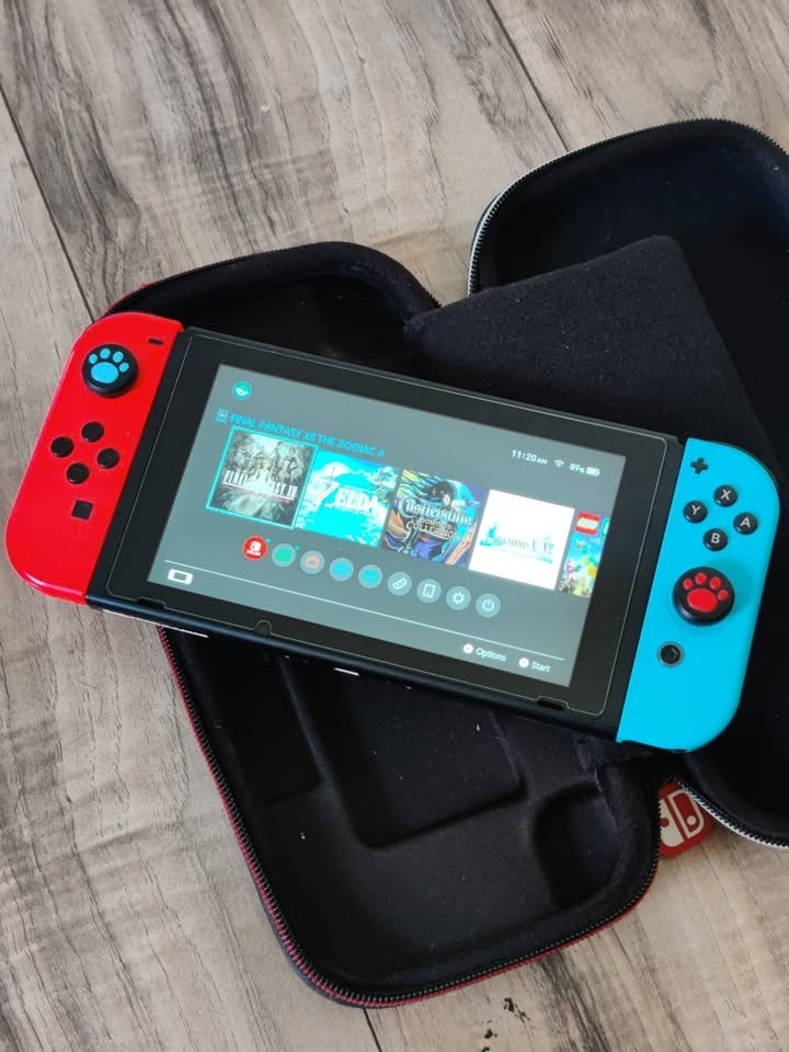 Nintendo Switch 96GB Handheld Console – Neon Red/Neon Blue (+ Travel Case)