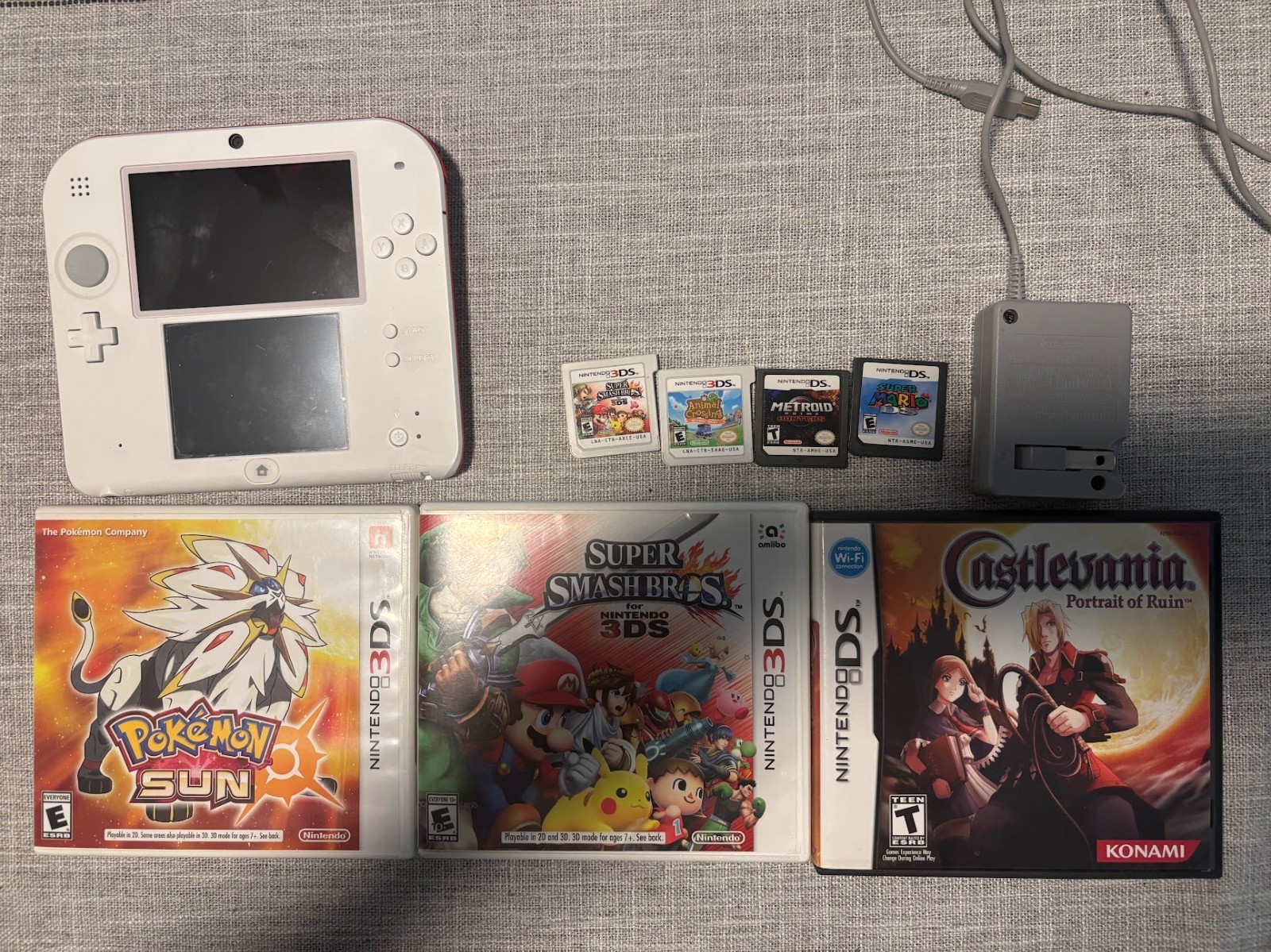 Nintendo 2DS White & Red Console Bundle – Includes Pokémon, Mario, Smash Bros &