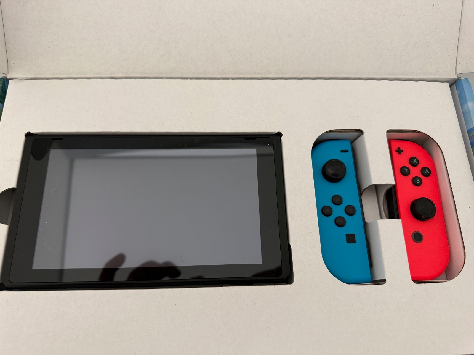 Nintendo Switch 32GB Handheld Console – Neon Red/Neon Blue