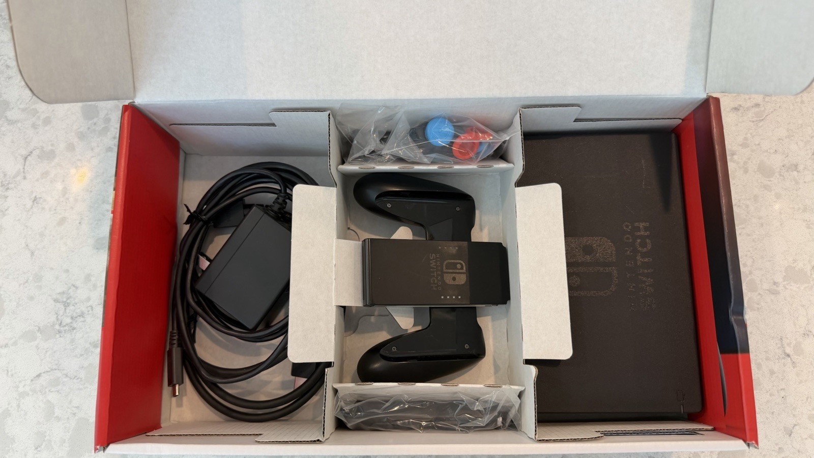 Nintendo Switch – Complete with Accessories in Original Box (2019/Revised Model)