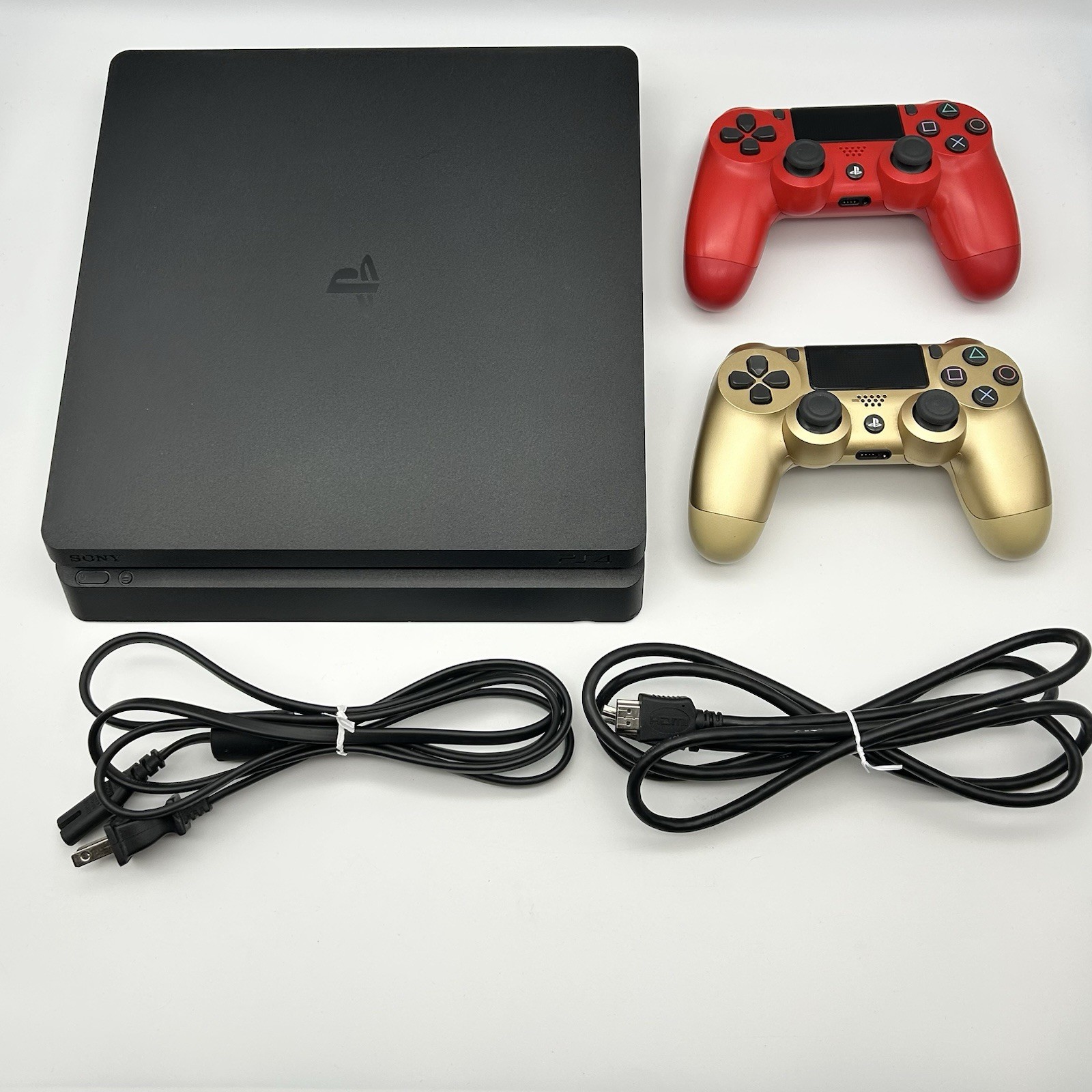 Sony PS4 Slim 1TB Console Bundle [Includes 2 Controllers, Power Cord, HDMI Cord]