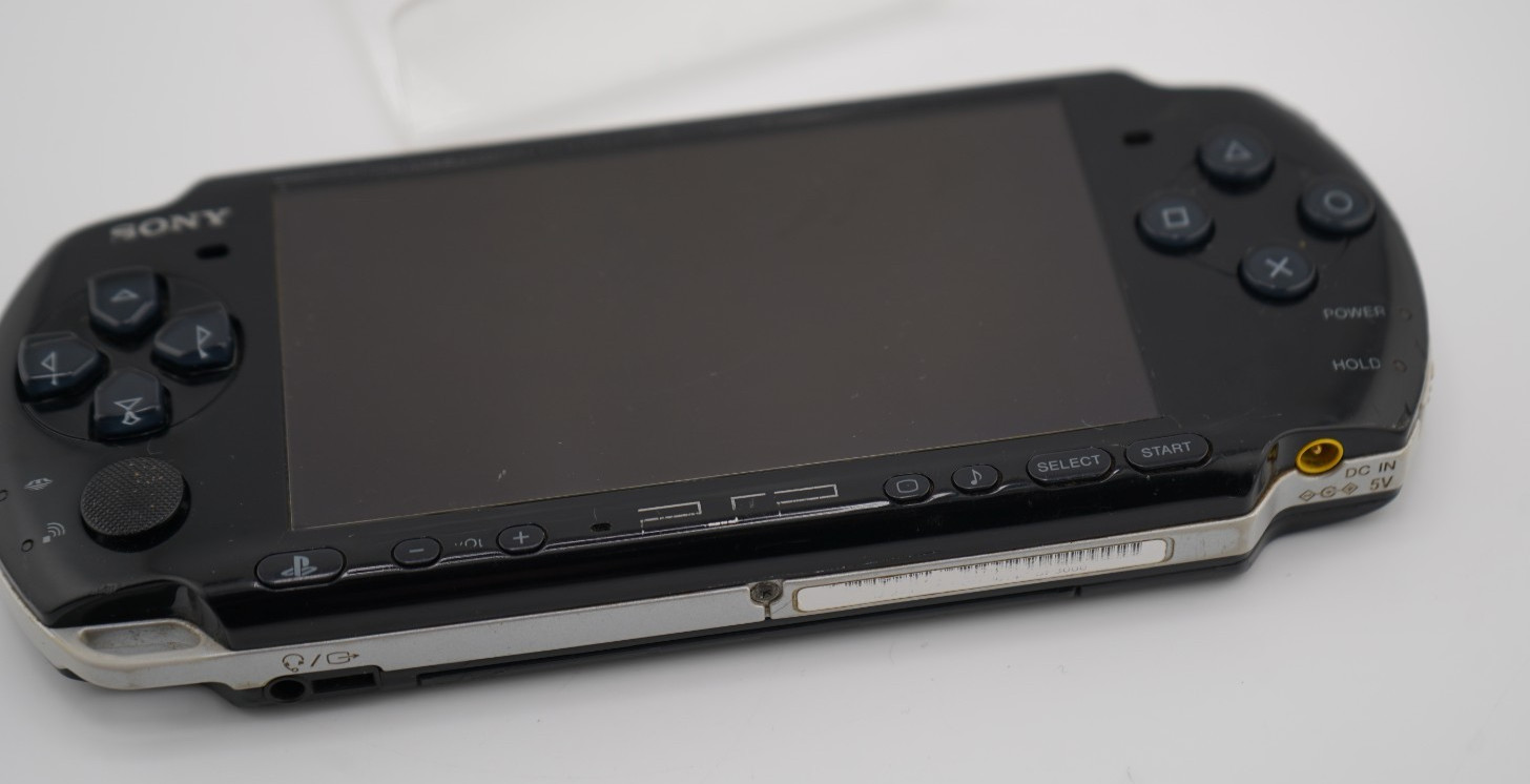 Sony PSP-3000 Console with OEM Battery, Game, 64GB SD, Case Bundle – Piano Black