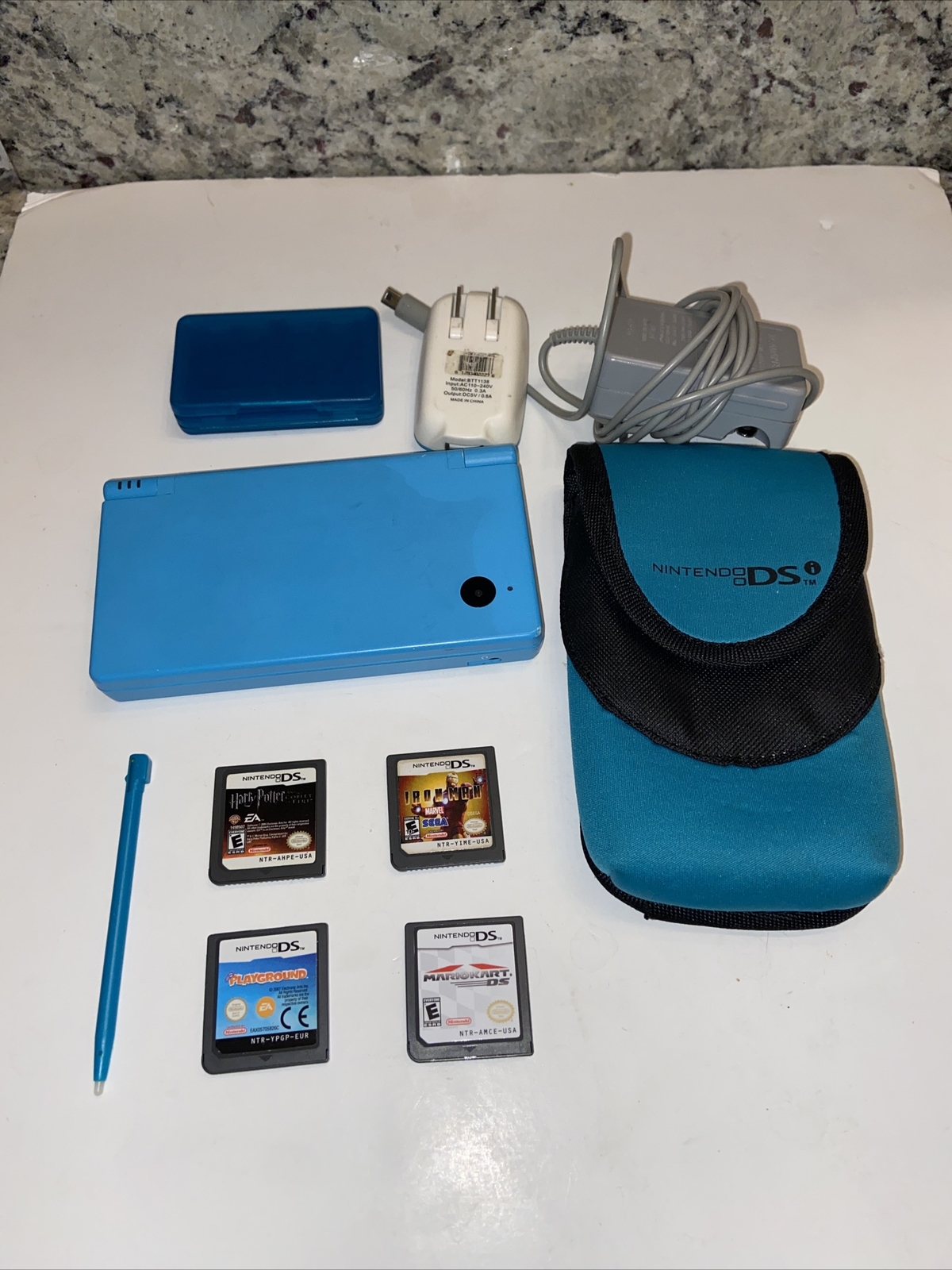Nintendo DSi Handheld Game Console – Blue w/ 4 Games, Charger + Case + Stylus.