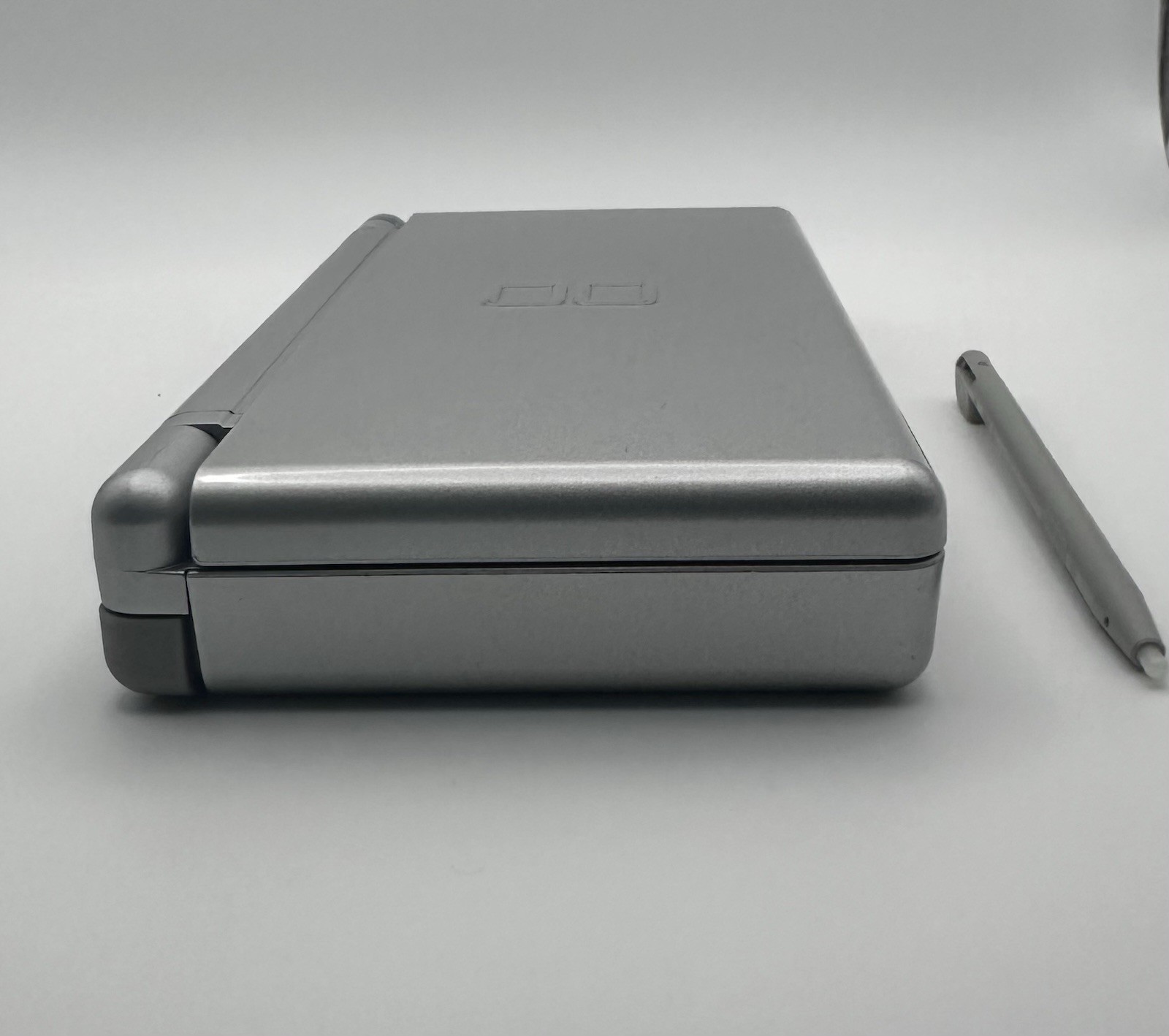 Nintendo DS Lite Silver Console w/ Stylus + Nicktoons Game (No Charger included)