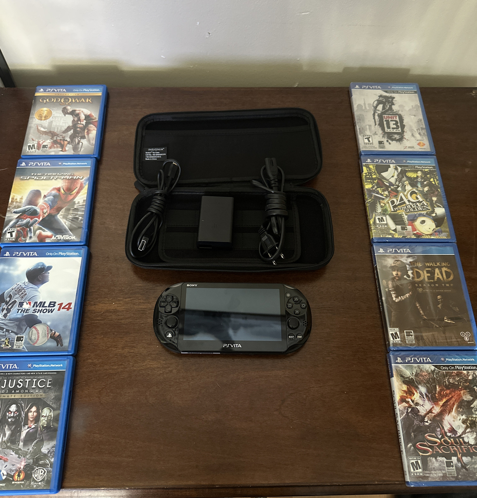 Sony PS Vita PCH-2001 Handheld Console System + USB – 16GB Card, 8 Games