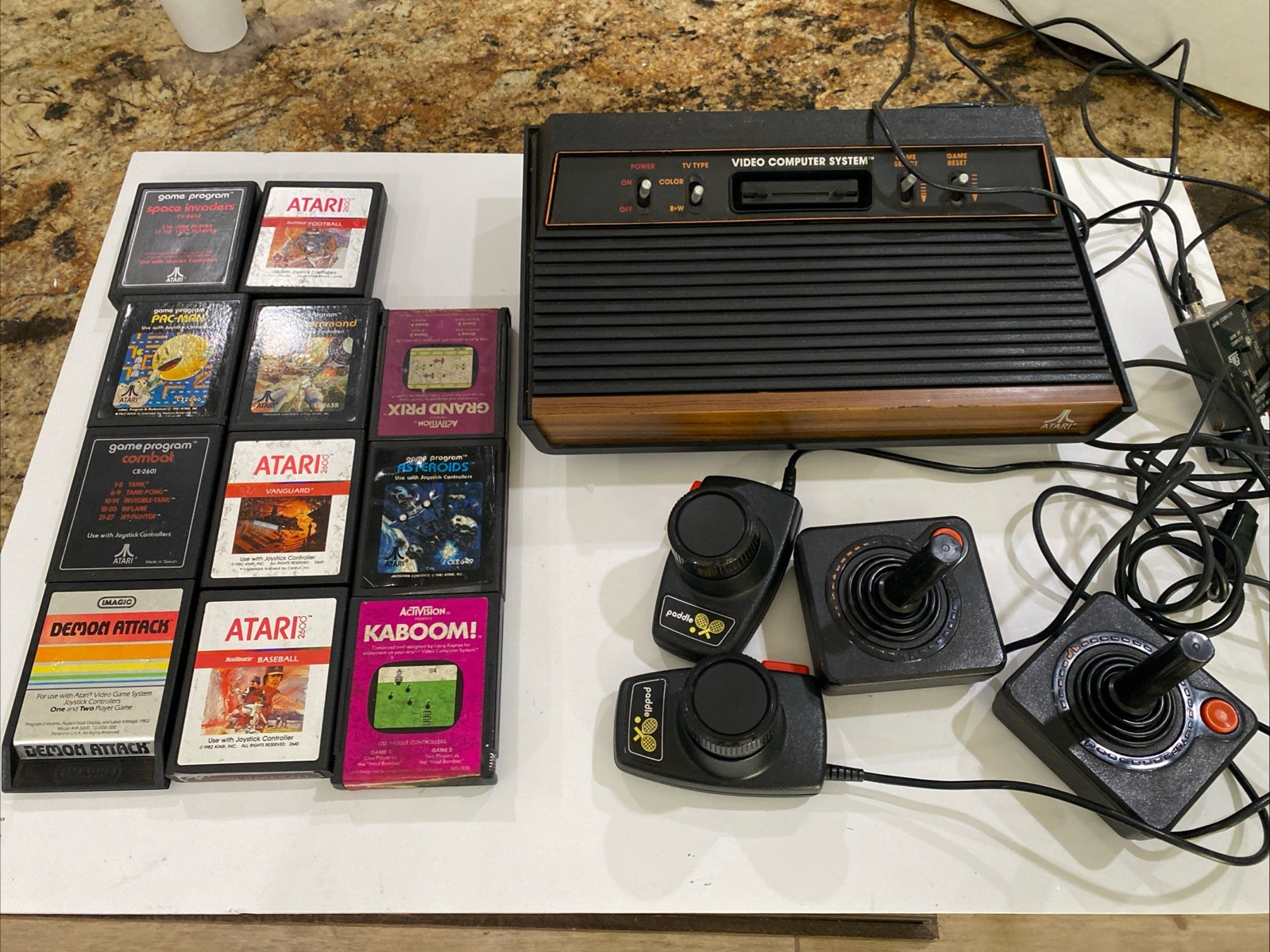Atari 2600 4 Switch system console w/ 11 games 4 joysticks No Power Untested
