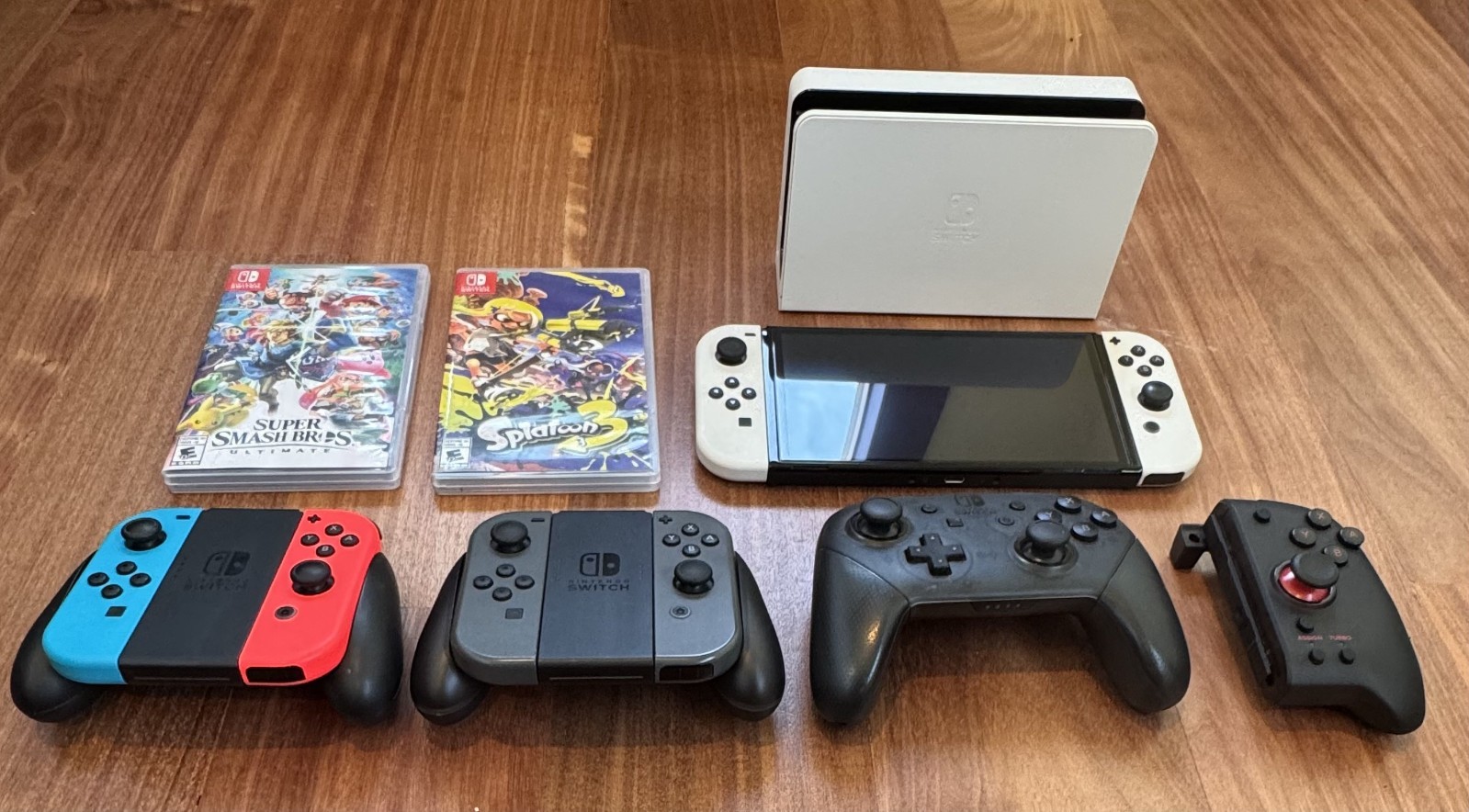 Nintendo Switch OLED Handheld Console – 64GB White (GAMES+CONTROLLERS INCLUDED)