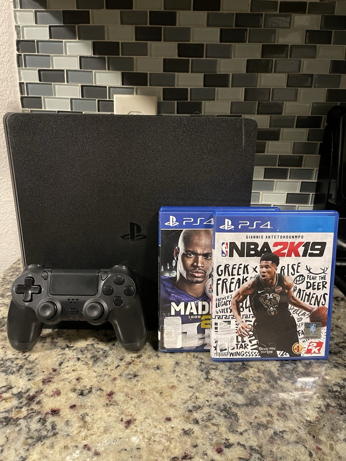 PlayStation 4 Slim 500GB Gaming Console with Controller – Black & 2 Ganes