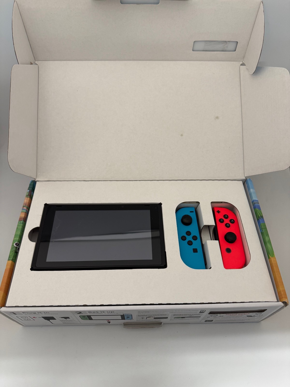 Nintendo Switch 32GB Handheld Console – Neon Red/Neon Blue
